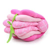 Coussin d'allaitement pour bébé rose emballé comme un cadeau