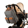 Sac a dos de maternite pour les parents accroché à la poussette