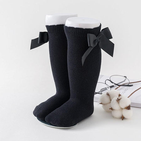 Élégantes chaussettes pour bébé en coton rose vif avec nœuds pailletés