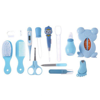 Kit de soin detail accessoires ciseaux coupe ongles peigne et thermomètre bleu pour bébé